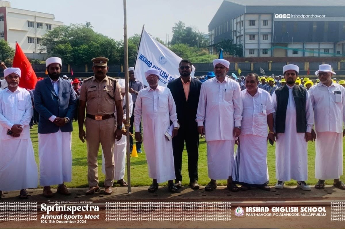 Chief guests and dignitaries with the school flag at the Sprintspectra Annual Sports Meet 2024